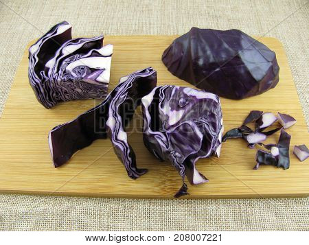 Cutted fresh red cabbage on a wooden board