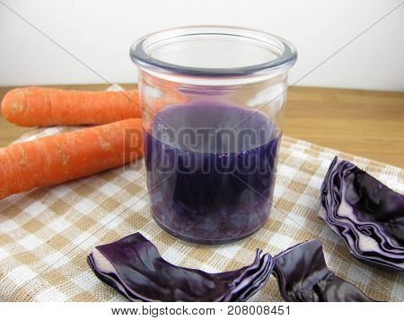 Fresh red cabbage smoothie with tasty carrot
