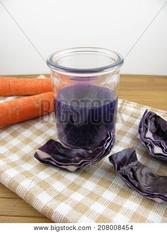 Fresh red cabbage smoothie with tasty carrot