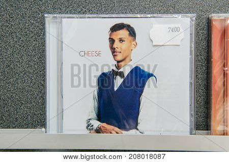STRASBOURG; FRANCE - OCT 1; 2017: Music record store with audio CD of Stromae; singer on the shelf