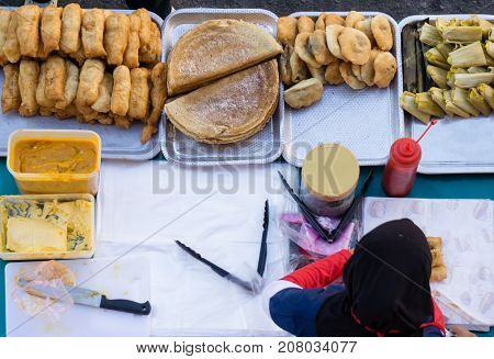 Top View Of Unidentified Stall Vendor Selling Variety Of Malaysian Food, Cakes And Dessert In Kota K