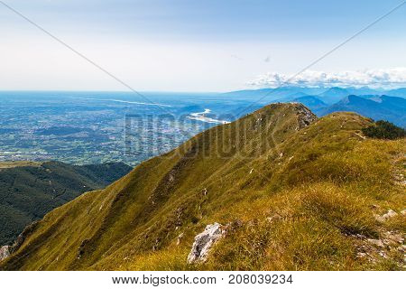 On The Summit Of An Alpine Peak
