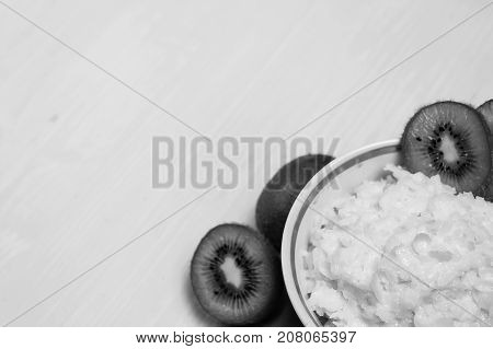 Porridge with kiwi on breakfast black and white poster