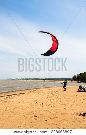 Windsurfing On The Beach Of The Big Izhora Gulf Of Finland