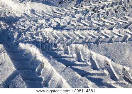 Snow-covered Road In The Winter Season. Close-up Photo