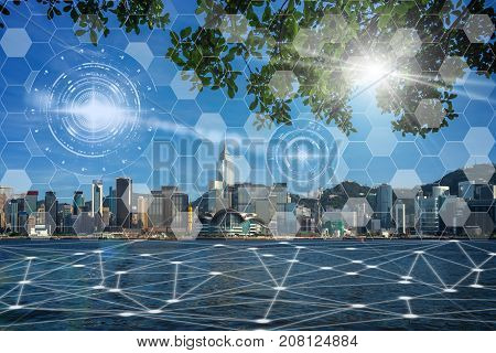 Communication network with digital virtual screen of Hong Kong Cityscape river side in the afternoon with smooth cloud at Victoria harbour Technology Smart City with Internet of Things concept, 3D illustration