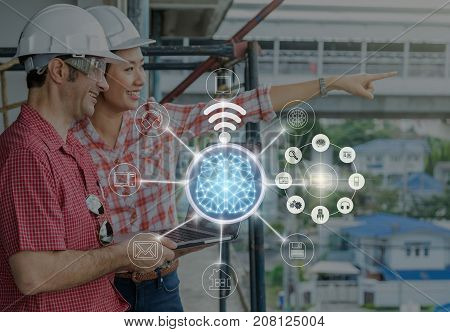 Happy professional construction engineers working with Corporate Colleagues Teamwork and technology laptop over the multichannel omni channel at the building site placeindustry and technology concept, 3D illustration