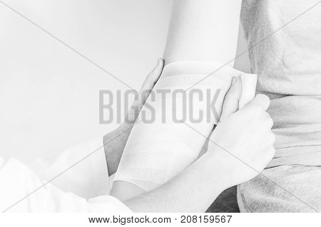 Compression Bandage To Inflammation, Application A Spiral Bandage. Application A Spiral Bandage In S