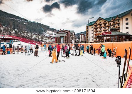 BUKOVEL, UKRAINE, March 06, 2017: Skiers and tourists in the Ukrainian resort Bukovel, the Carpathians UKRAINE March 06 2017