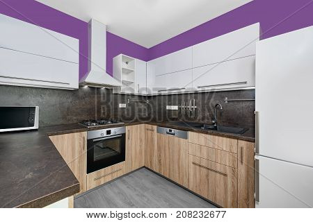 Modern kitchens combined with white and purple color and oak wood.