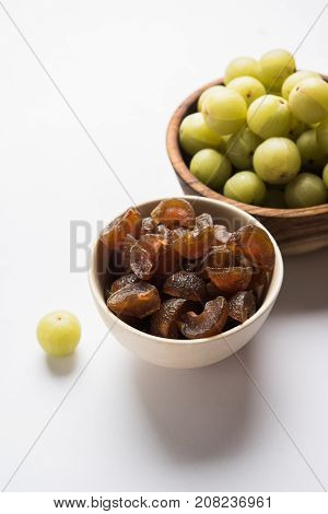 Stock photo of dried sweet and salty or chatpata Amla/Avla/Aavla called murabba, muramba or candy, selective focus