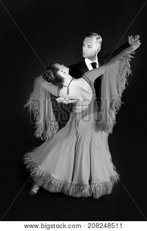 Ballrom Dance Couple In A Dance Pose Isolated On Black Background