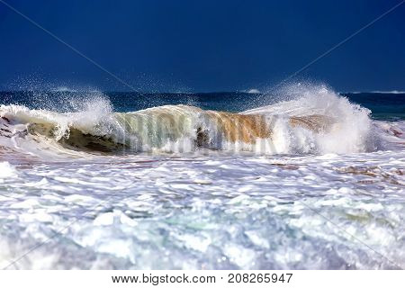 Powerful wave and surf on the coast of the ocean