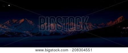 Night in Swiss Alps. Landscape of Crans-Montana range in Swiss Alps mountains with peak in background, Crans Montana, Switzerland.