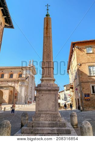 Urbino - View Of The Obelisk On The Square