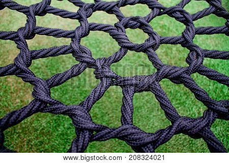 Net background side view and green grass