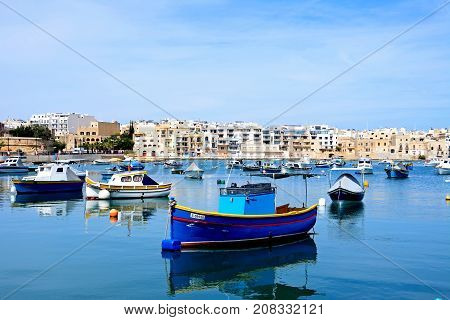 BIRZEBBUGA, MALTA - APRIL 1, 2017 - Traditional Maltese fishing boats in the harbour Birzebbuga Malta Europe, April 1, 2017.