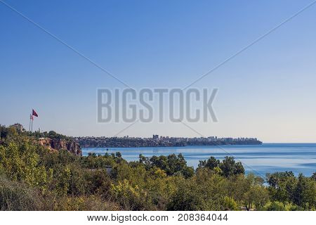 Panoramic view on Antalya city old town Kaleici and Mediterranean Sea from the Beach park. Antalya Turkey.