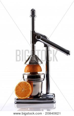 Chrom Citrus Juicer und Orange Hälften