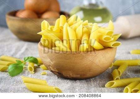 Penne Rigate. Macaroni In The Form Of Feathers. Mostaccioli Pasta
