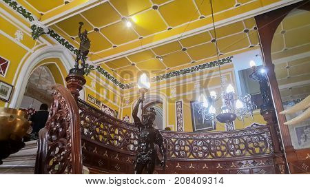 BENGALURU INDIA - FEBRUARY 20 2017: Interior decoration of famous Bangalore Palace. It was private residence of the royal Wodeyar family. It is filled with rare collection of art and paraphernalia from a bygone era.
