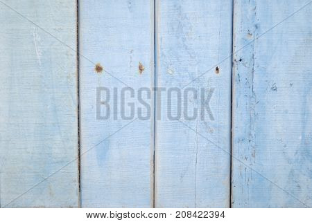 Vertical plank pale blue painted wood texture background