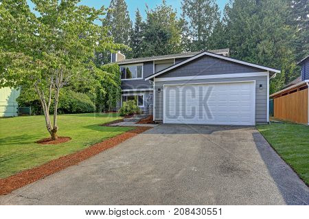 Lovely Grey Rambler House Exterior Features Grey Siding