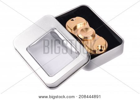 Metallic fidget spiner isolated on white background