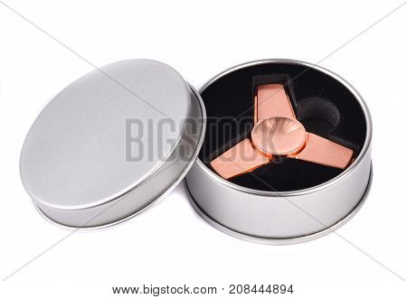 Metallic fidget spiner isolated on white background