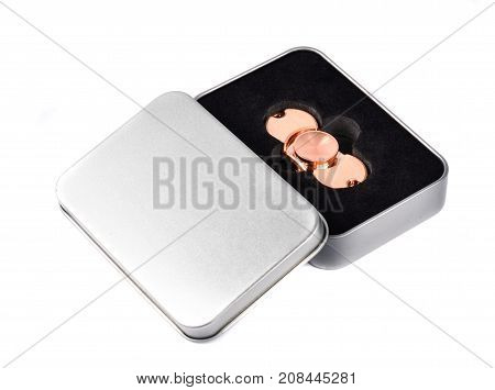 Metallic fidget spiner isolated on white background