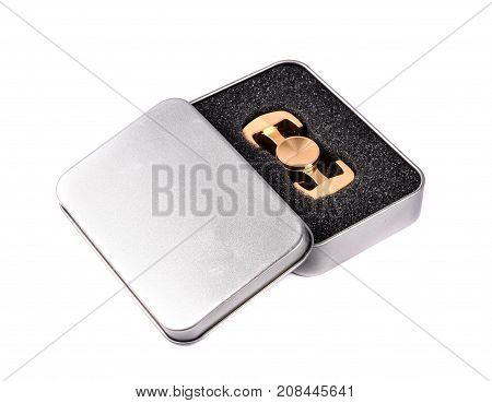 Metallic fidget spiner isolated on white background