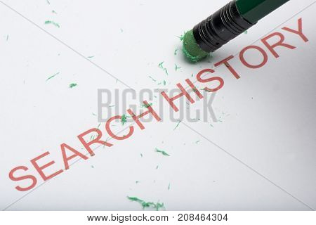 Pencil Erasing The Word 'search History' On Paper