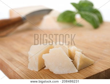 parmesan cheese in front of white background