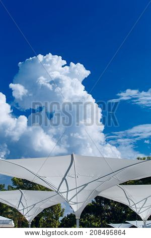 The summer sunshade is filled with clouds.