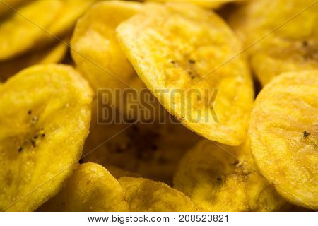 Stock Photo of Healthy Homemade Kela or Banana chips or wafers or Plantain Chips, selective focus