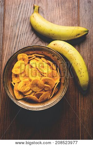 Stock Photo of Healthy Homemade Kela or Banana chips or wafers or Plantain Chips, selective focus