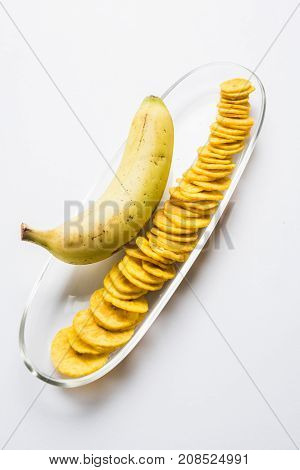 Stock Photo of Healthy Homemade Kela or Banana chips or wafers or Plantain Chips, selective focus
