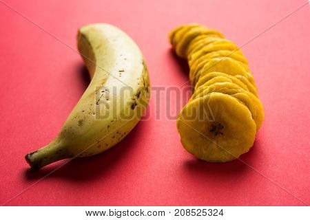 Stock Photo of Healthy Homemade Kela or Banana chips or wafers or Plantain Chips, selective focus