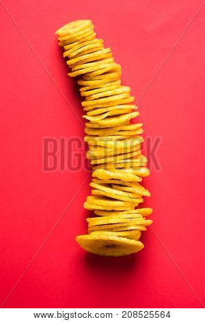 Stock Photo of Healthy Homemade Kela or Banana chips or wafers or Plantain Chips, selective focus