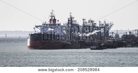 Ships unloading at Fawley refinery Near Southampton