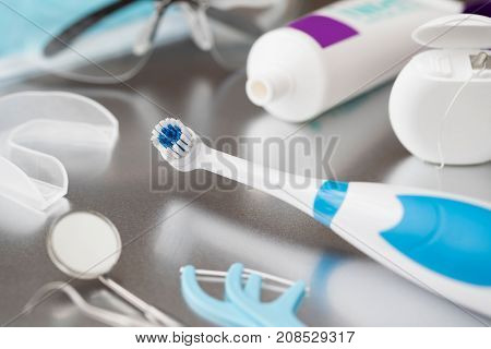 Selection Of Dental Health Treatments And Instruments On Metal Surface