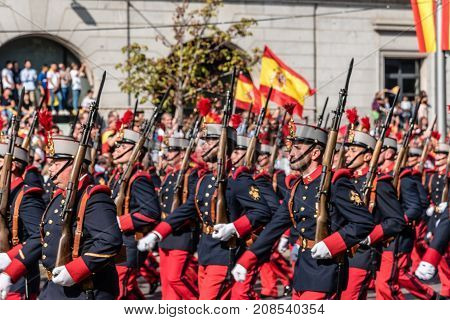 Madrid Spain - October 12 2017: Soldiers in traditional costume marching in Spanish National Day Army Parade. Several troops take part in the army parade for Spain's National Day.