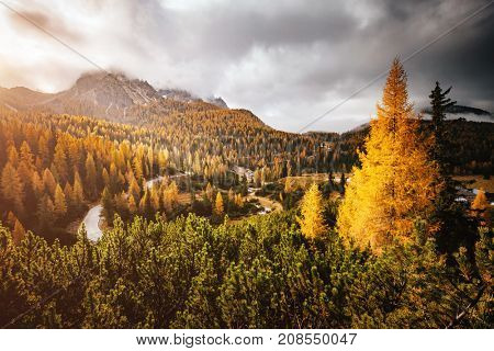 Stunning image of the alpine road. Dramatic morning scene, gloomy weather. Location famous place National Park Tre Cime di Lavaredo, Misurina, Dolomiti alps, South Tyrol, Italy, Europe. Beauty world.
