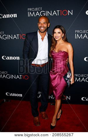 NEW YORK- OCT 24: Actor Amaury Nolasco (L) and Eva Longoria attend the global premiere of Canon's 