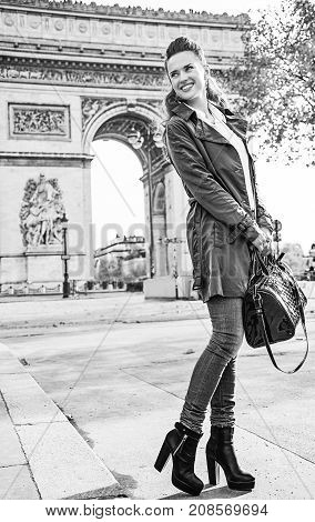 Smiling Young Trendy Woman In Paris, France Looking Aside