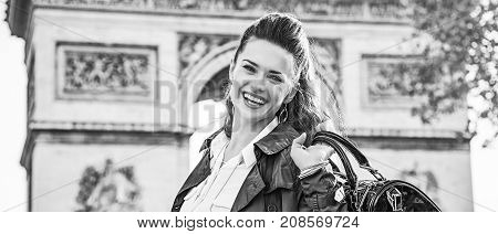 Smiling Elegant Woman Near Arc De Triomphe In Paris, France