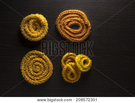 Various shapes and sizes of an authentic Indian snacks Murukku or Chakali. 
