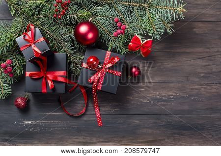 Black Christmas  Gift  Box With Red Ribbon And Fir Branches