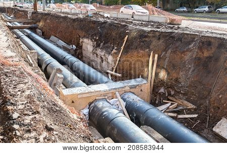 Repair work of heating duct. Replacement pipes of the heating main in summertime