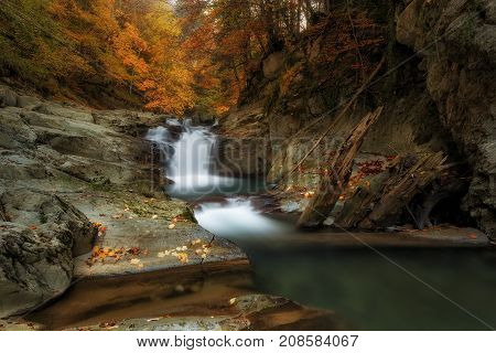 Cubo waterfall in Irati forest in autumn